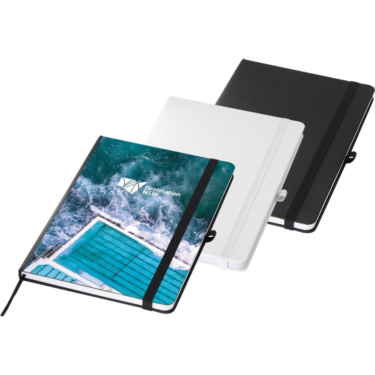 A set of three A5 notebooks in black, white, and a design featuring a blue swimming pool, with an elastic band closure.