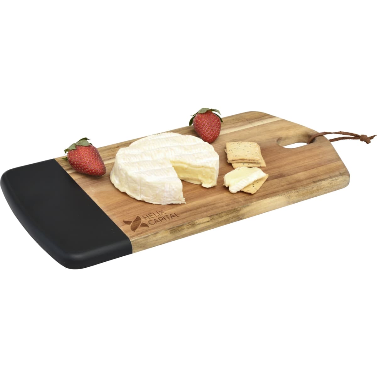 A wooden cheese board with a black edge, featuring brie cheese, crackers, and strawberries. It has a logo.