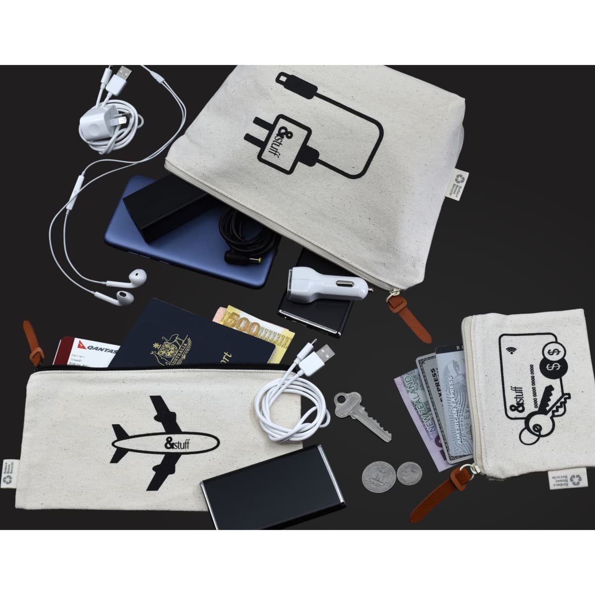 A beige travel set includes bags with various electronic accessories, a phone, cash, coins, and travel documents.