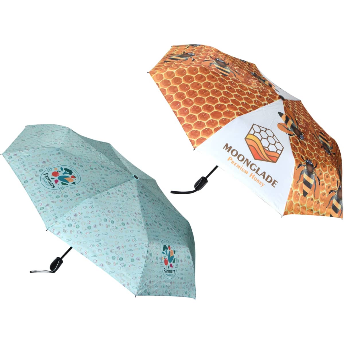 A full-colour umbrella featuring a honeycomb design and a pattern with small colourful icons. It has a logo on one panel.