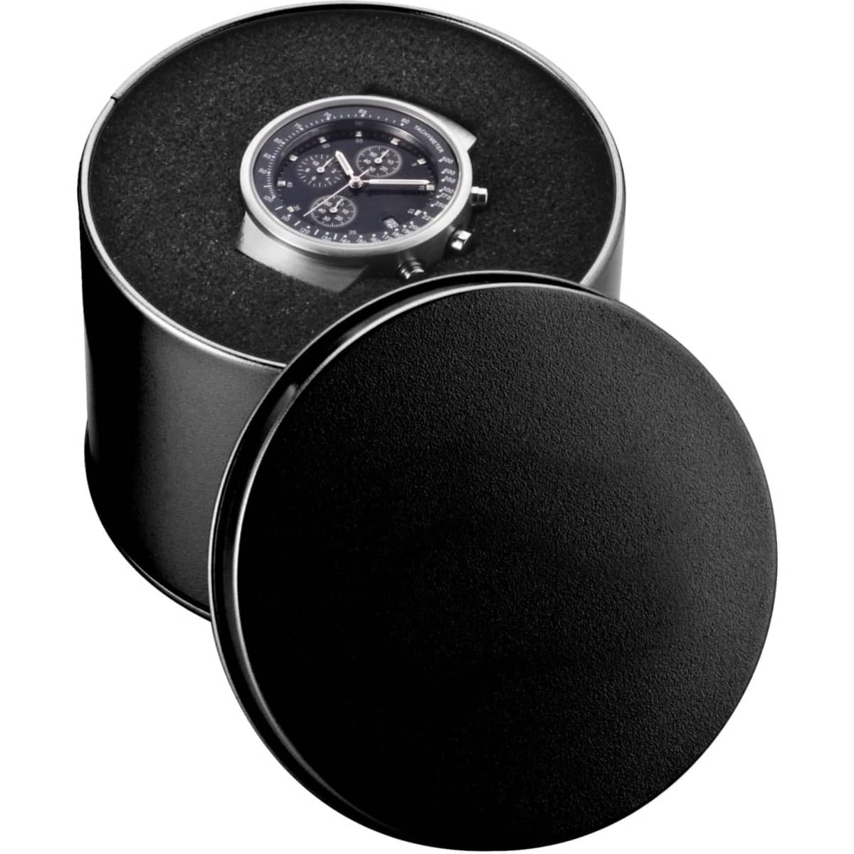 A round black watch case with a sleek watch displayed inside, featuring a dark watch face and metallic details.