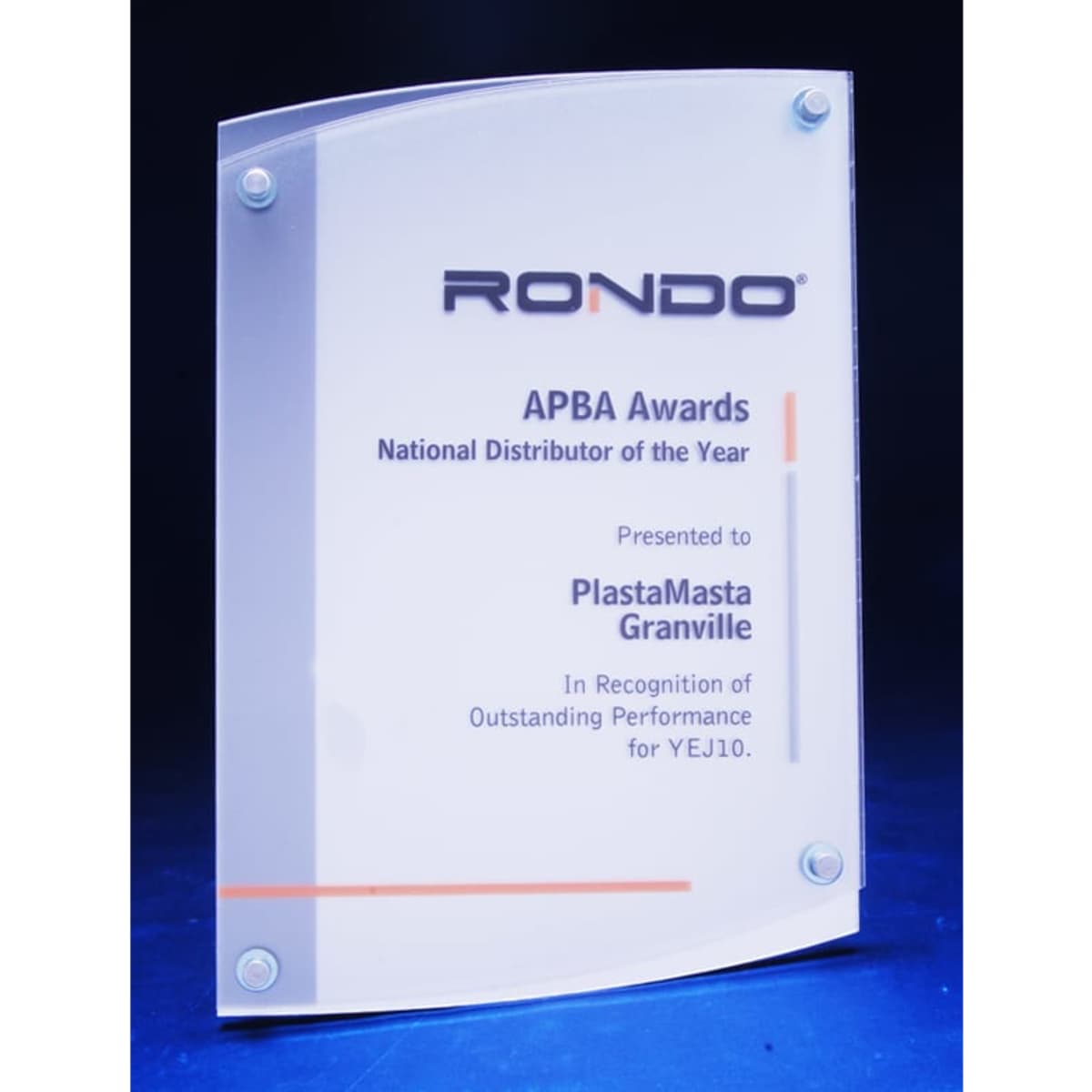 A transparent plaque with rounded edges, featuring an engraved award title and a logo at the top.