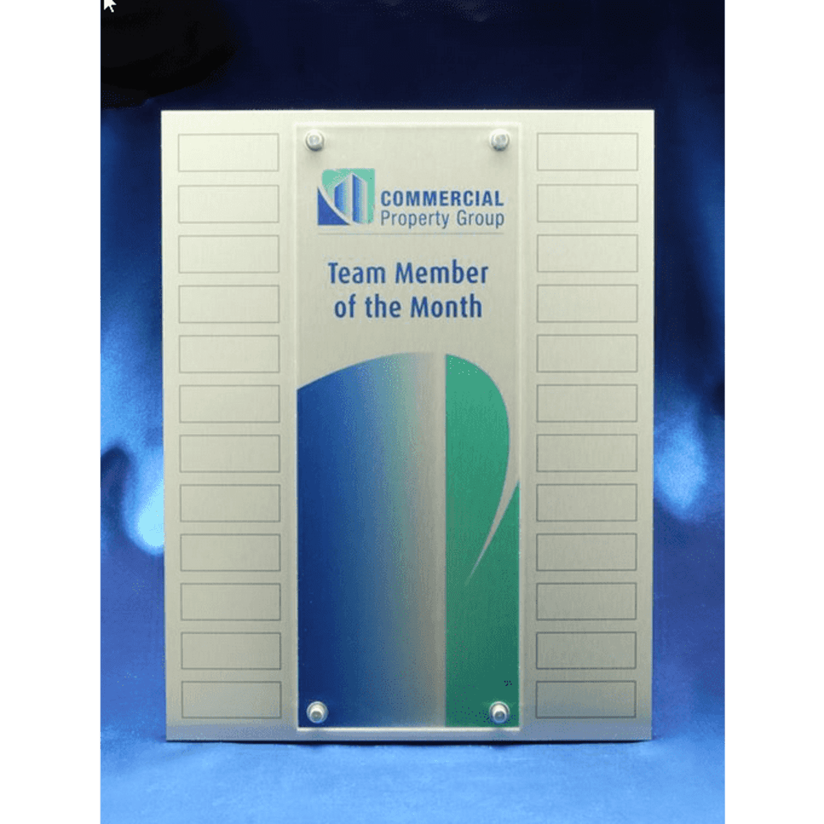 A perpetual award with a metallic finish and acrylic overlay, featuring a logo and multiple printed plates for names.