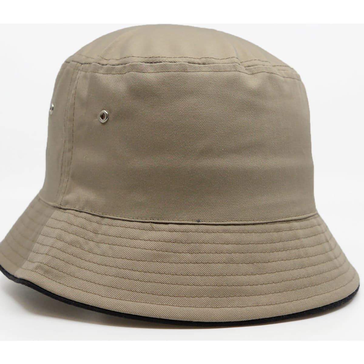 A tan bucket hat featuring a wide brim and vent holes, with a contrasting black underside.