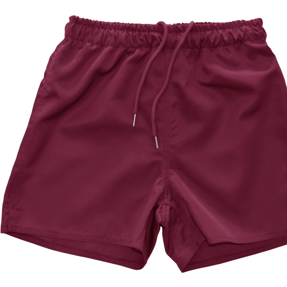 Maroon youth rugby shorts featuring an elastic waistband and drawstring, with a logo on the side.