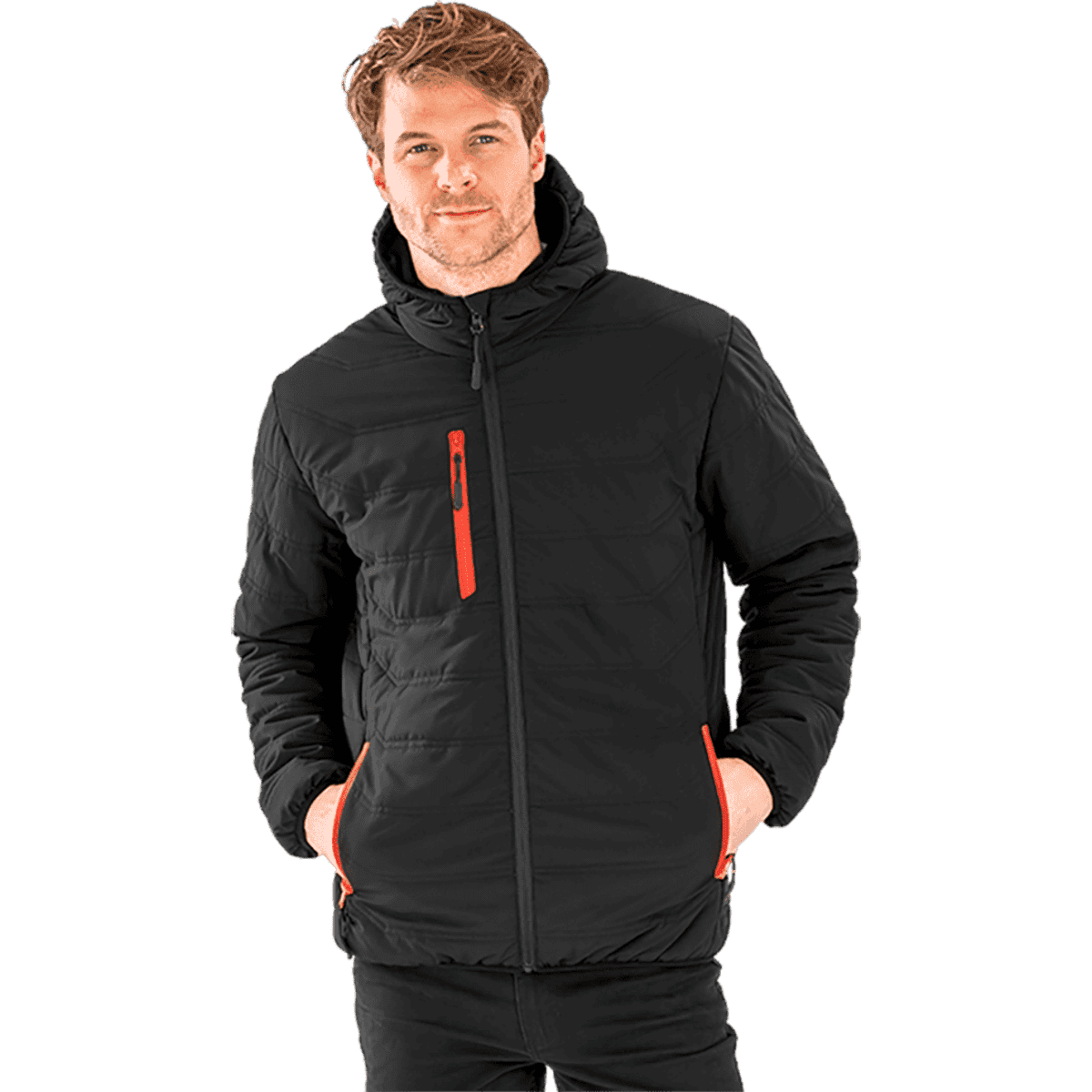 A padded winter jacket in black with orange accents, featuring a zippered front and pockets, worn by a smiling model.