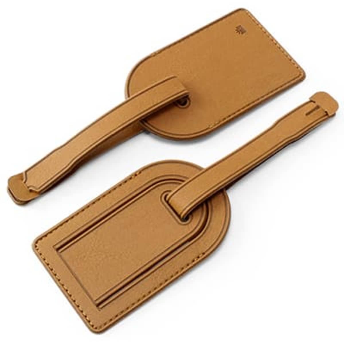 A set of two biodegradable small concealed luggage tags in a warm tan colour, featuring a sleek design and a logo.