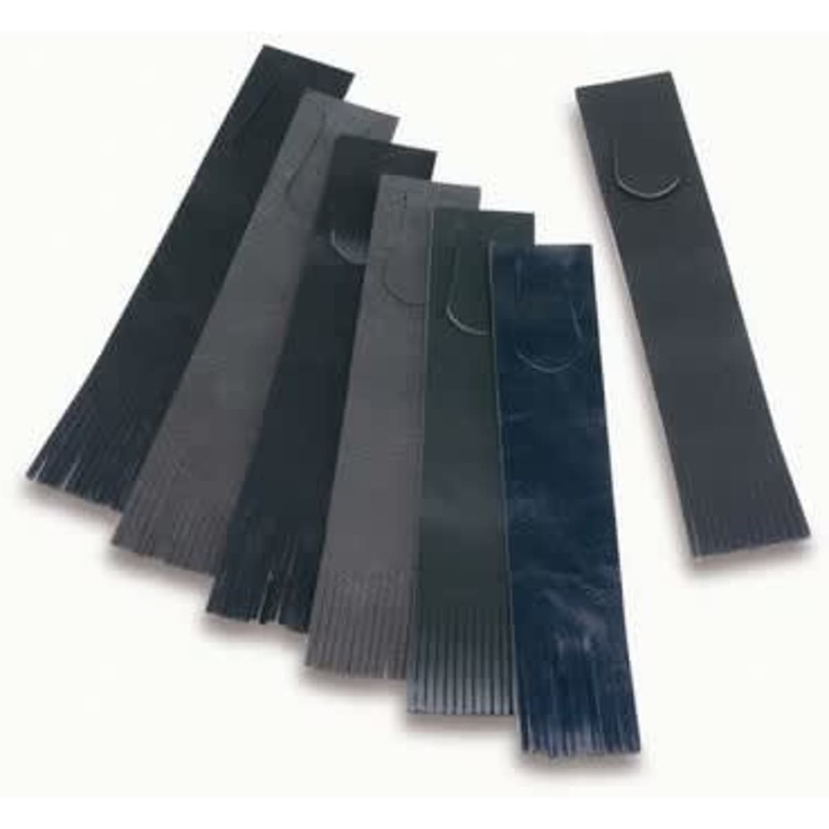 A selection of black leather bookmarks, featuring a smooth finish and varying lengths, all with a slight curvature at one end.