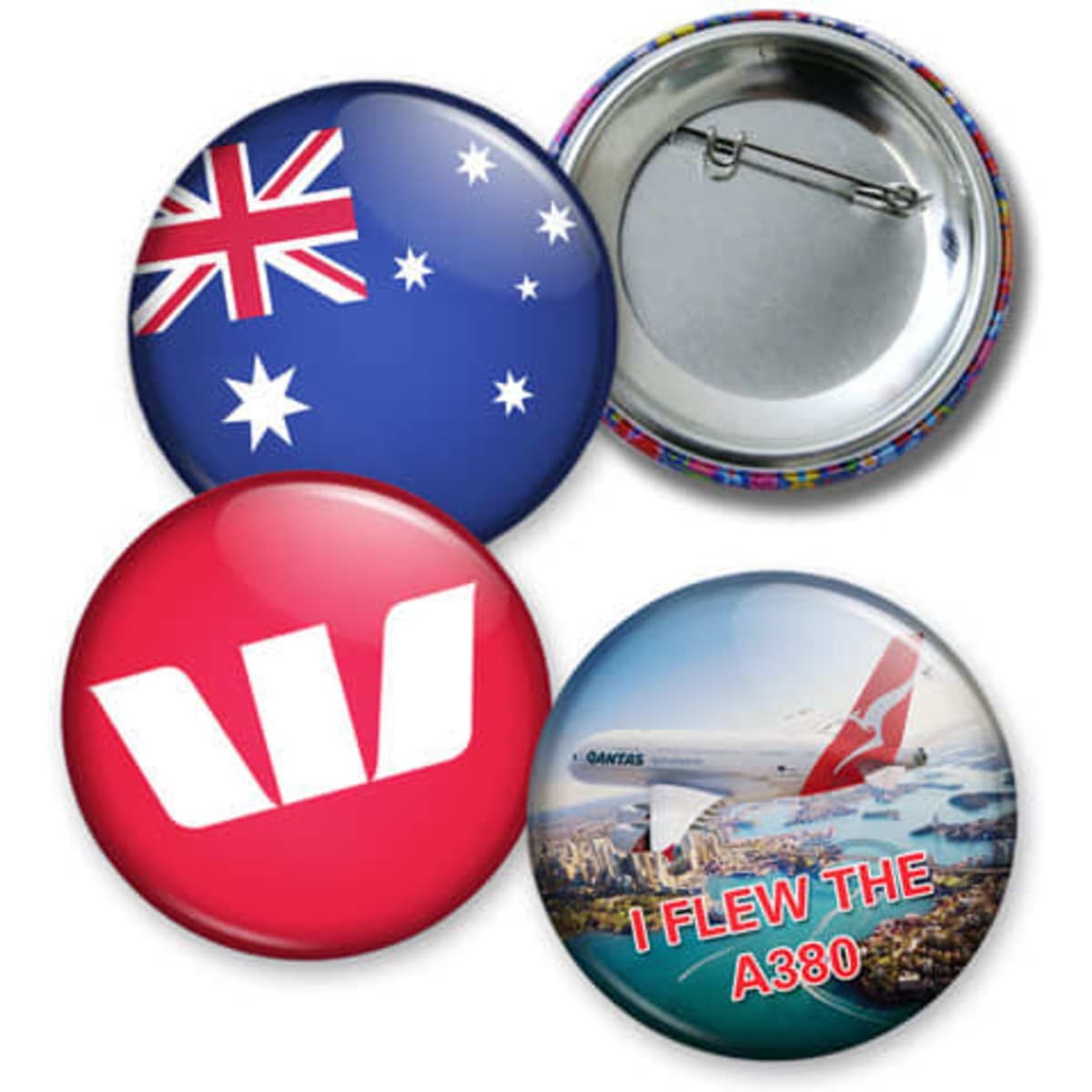 Four button badges featuring an Australian flag, a red logo, and an image of a Qantas A380, with a metallic backing.