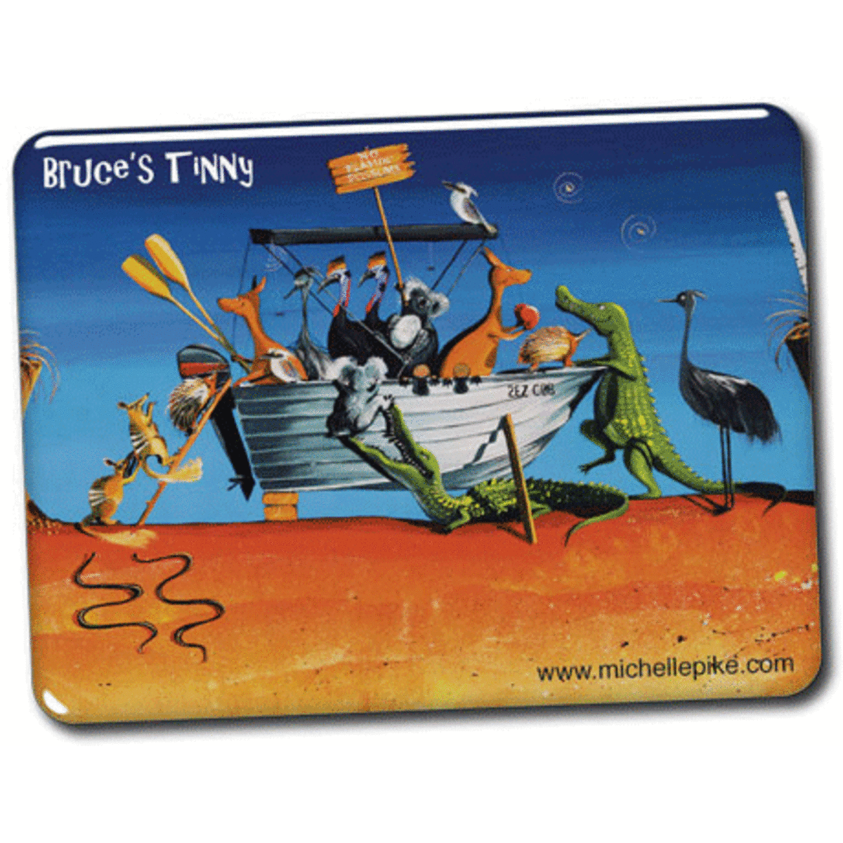 A colourful, domed fridge magnet featuring a whimsical scene of animals around a boat on a sandy shore.
