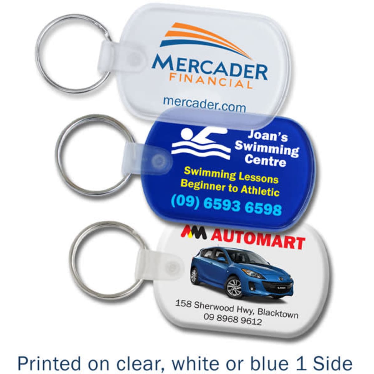 Three key tags in varying colours: clear, white, and blue, each featuring different logos and information.