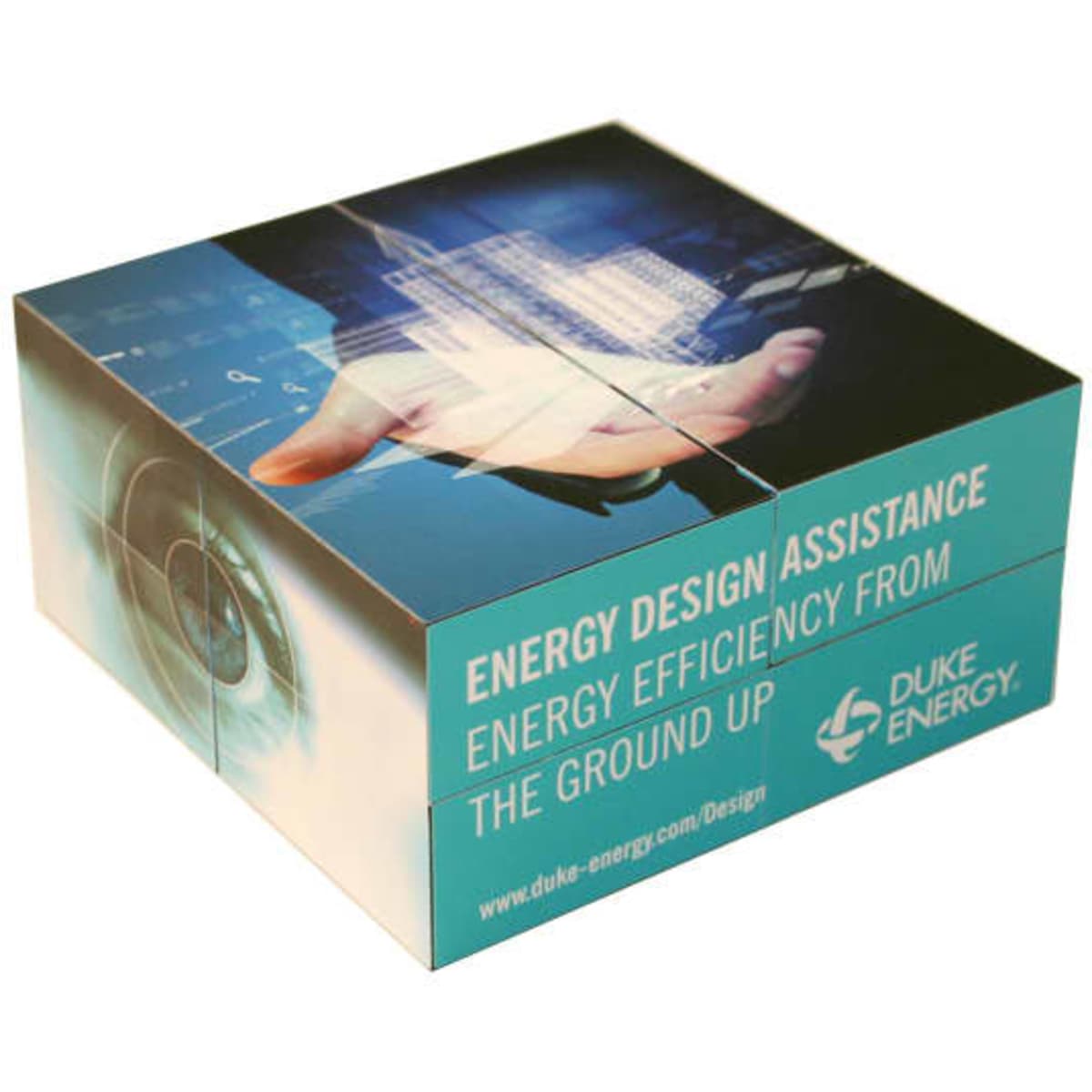 A promotional cube featuring a digital design, predominantly in teal, with a logo and graphical elements.