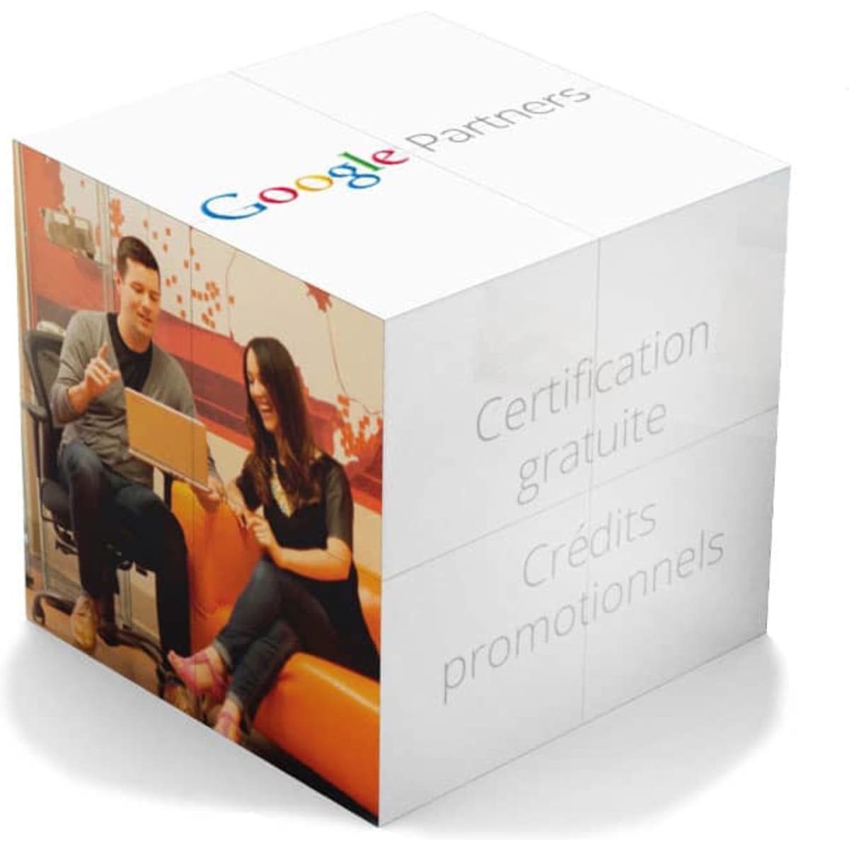 A three-dimensional promotional cube featuring images of two people, in white with a logo and text on its sides.