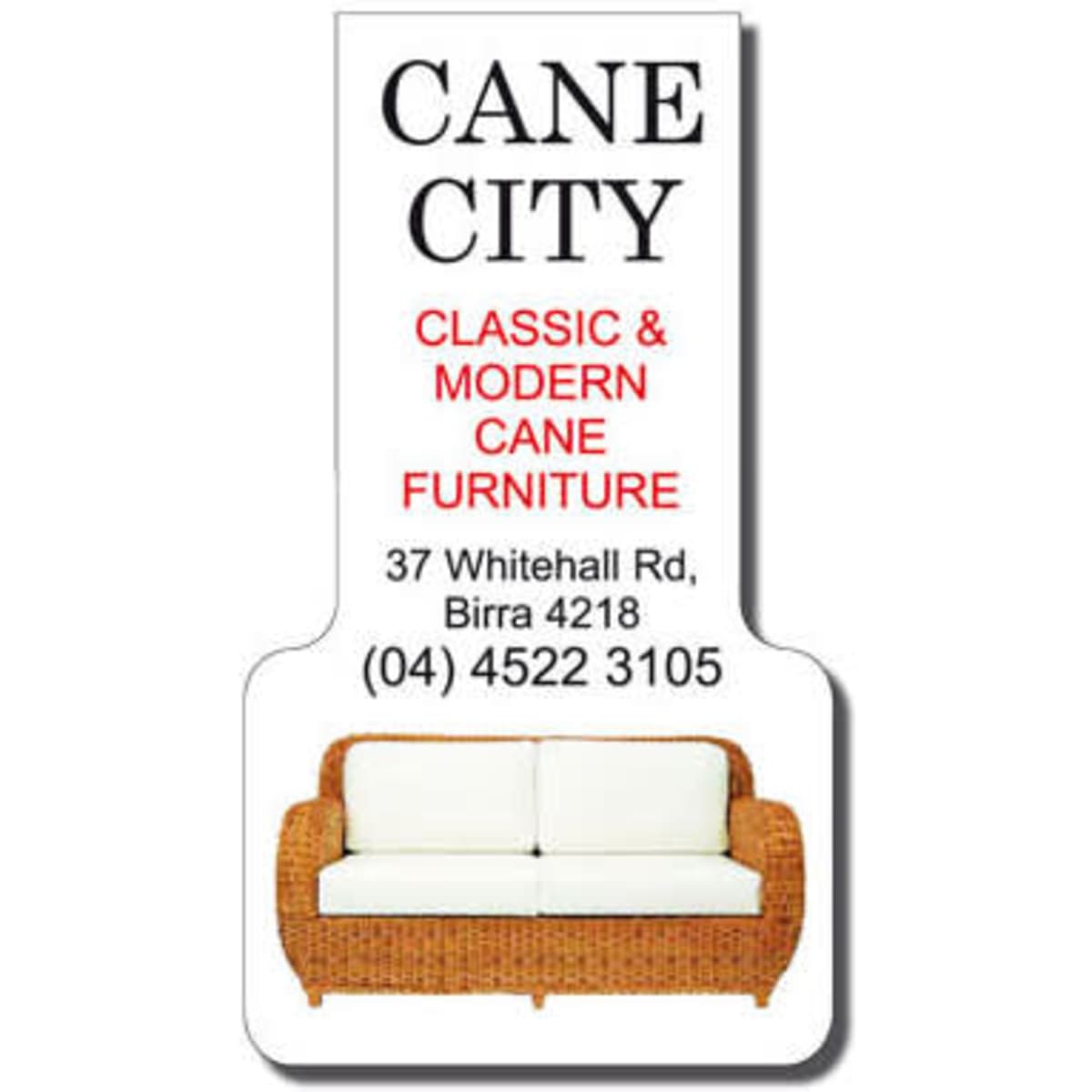 A promotional bookmark featuring a white sofa design, surrounded by text and a logo for a cane furniture store.