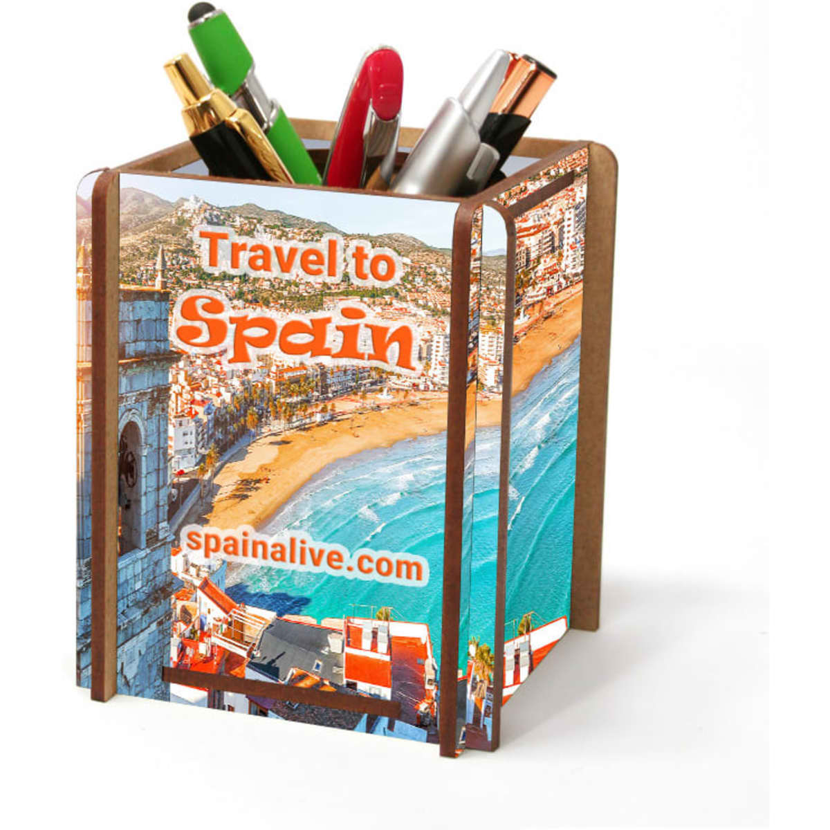 A full-colour pen caddy featuring various pens and pencils, with a vibrant image of a beach scene. The caddy has a logo.