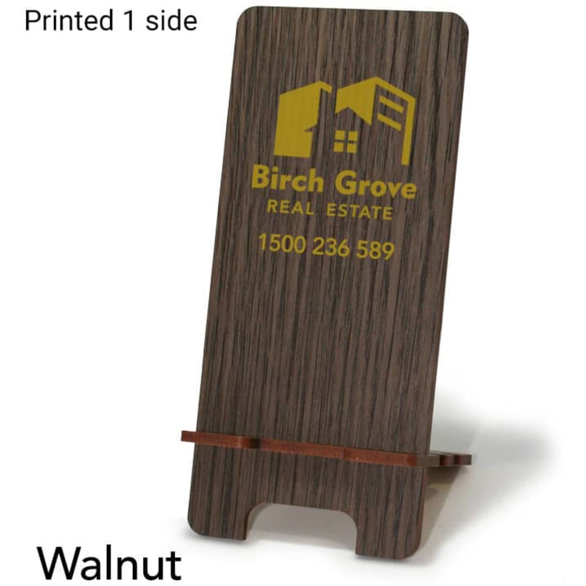 A walnut MDF phone holder featuring a logo on one side, standing upright.