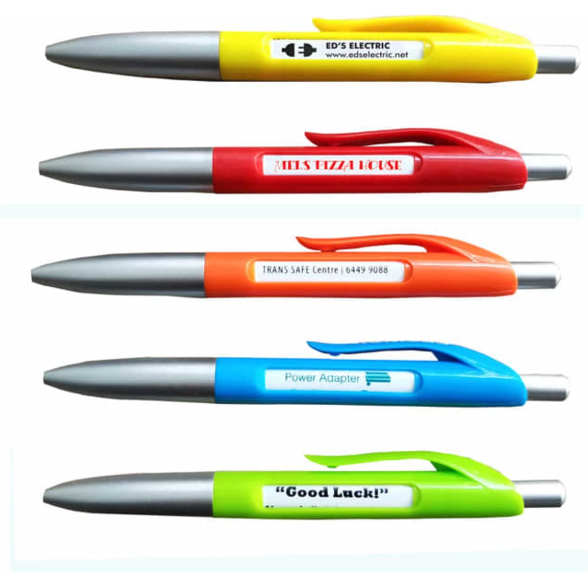 Five plastic pens in various colours: yellow, red, orange, blue, and green, each featuring a branding logo.
