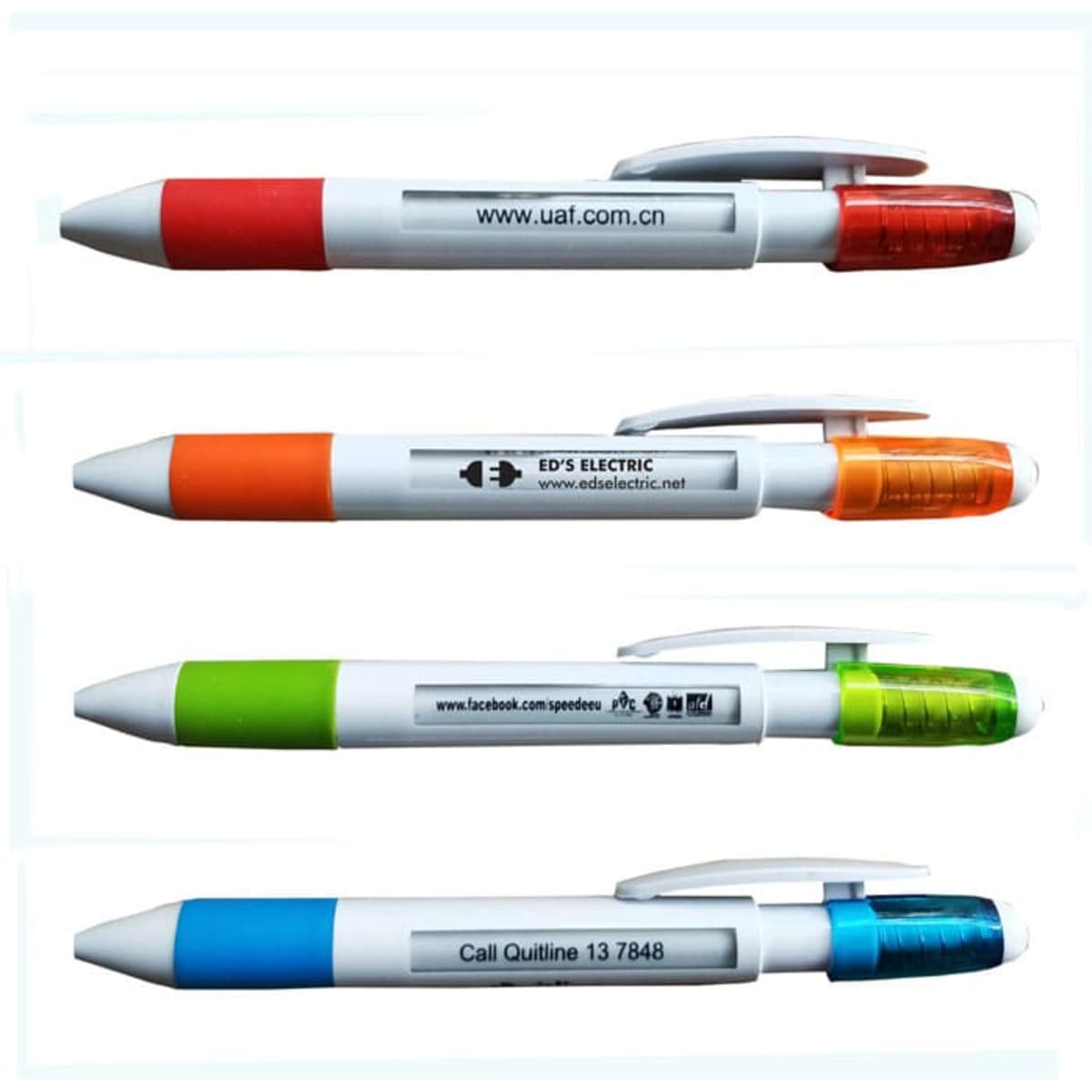 A group of four multi-coloured pens, featuring red, orange, green, and blue accents, with various logos and branding.