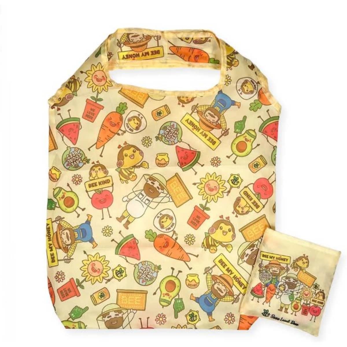 A foldable shopping bag in cream with colourful illustrations of animals, fruits, and flowers, accompanied by a matching pouch.