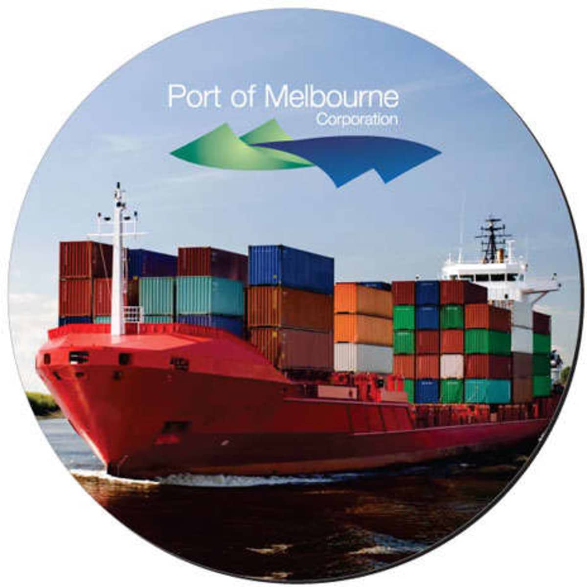 A round mat featuring a red cargo ship loaded with colourful shipping containers, set against a blue sky.