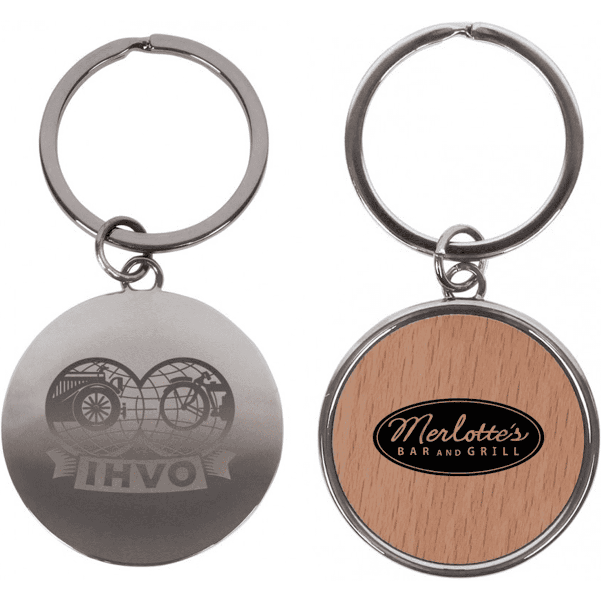 A round keychain in silver with a wood-patterned side featuring a logo and design elements.