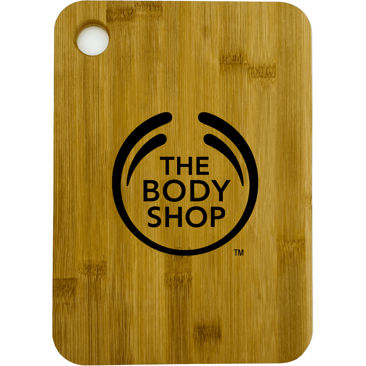 A large bamboo cutting board with rounded corners, featuring a logo on the surface.