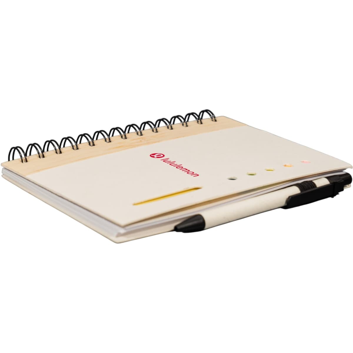 A spiral-bound notebook with a white cover, featuring a pen and a logo. The pages are blank with a yellow accent.