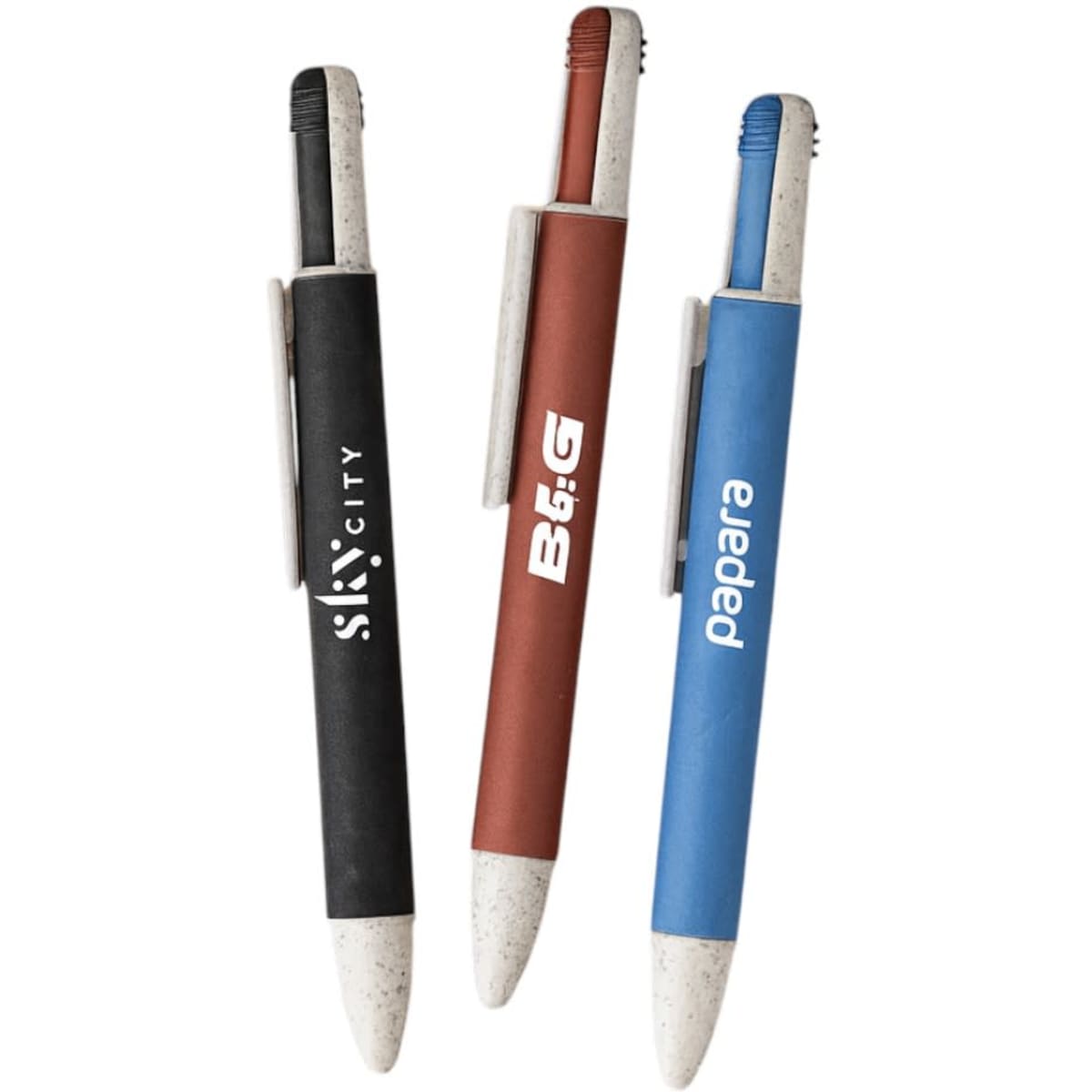 Three eco-friendly pens in black, red, and blue, featuring a natural, textured barrel and clips. Each has a logo.