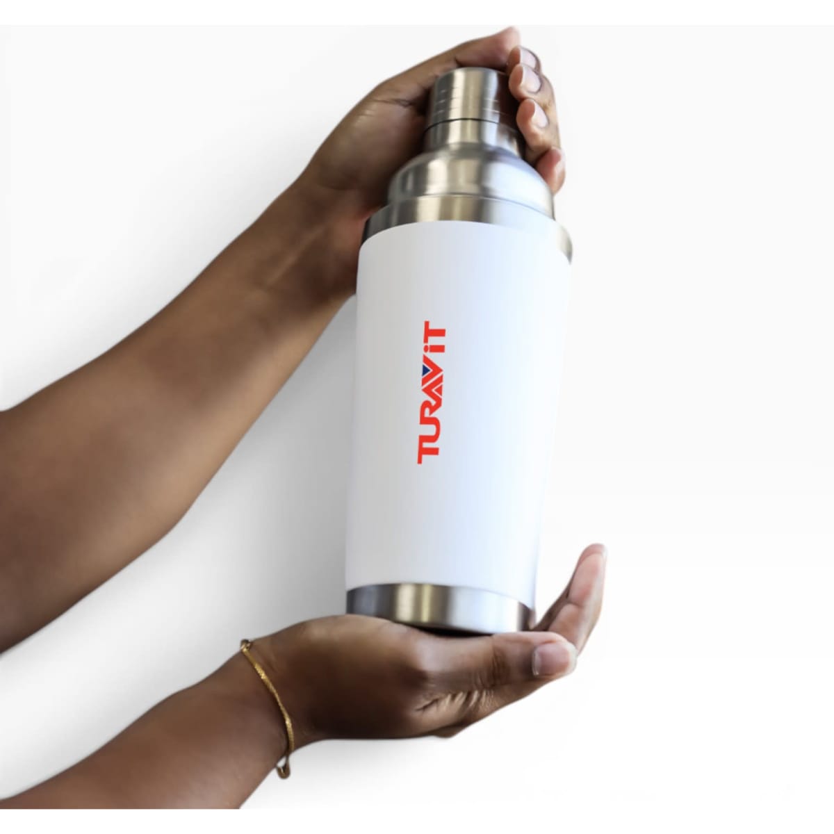 A drink bottle in silver and white, featuring a logo, held between two hands.