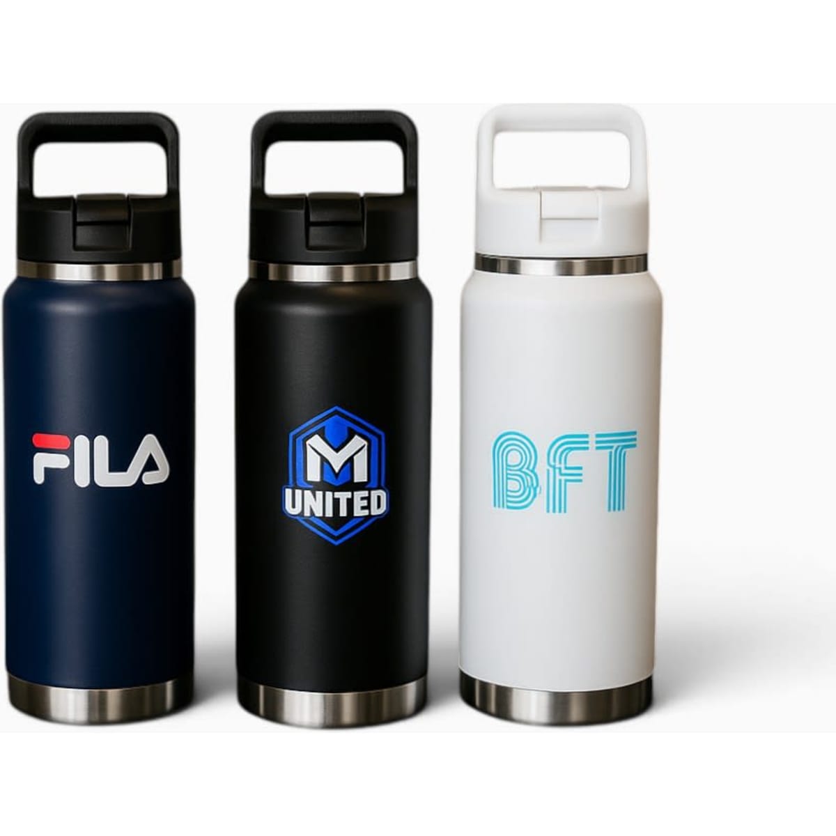 A drink bottle trio in navy blue, black, and white, featuring logos on the front of each bottle.