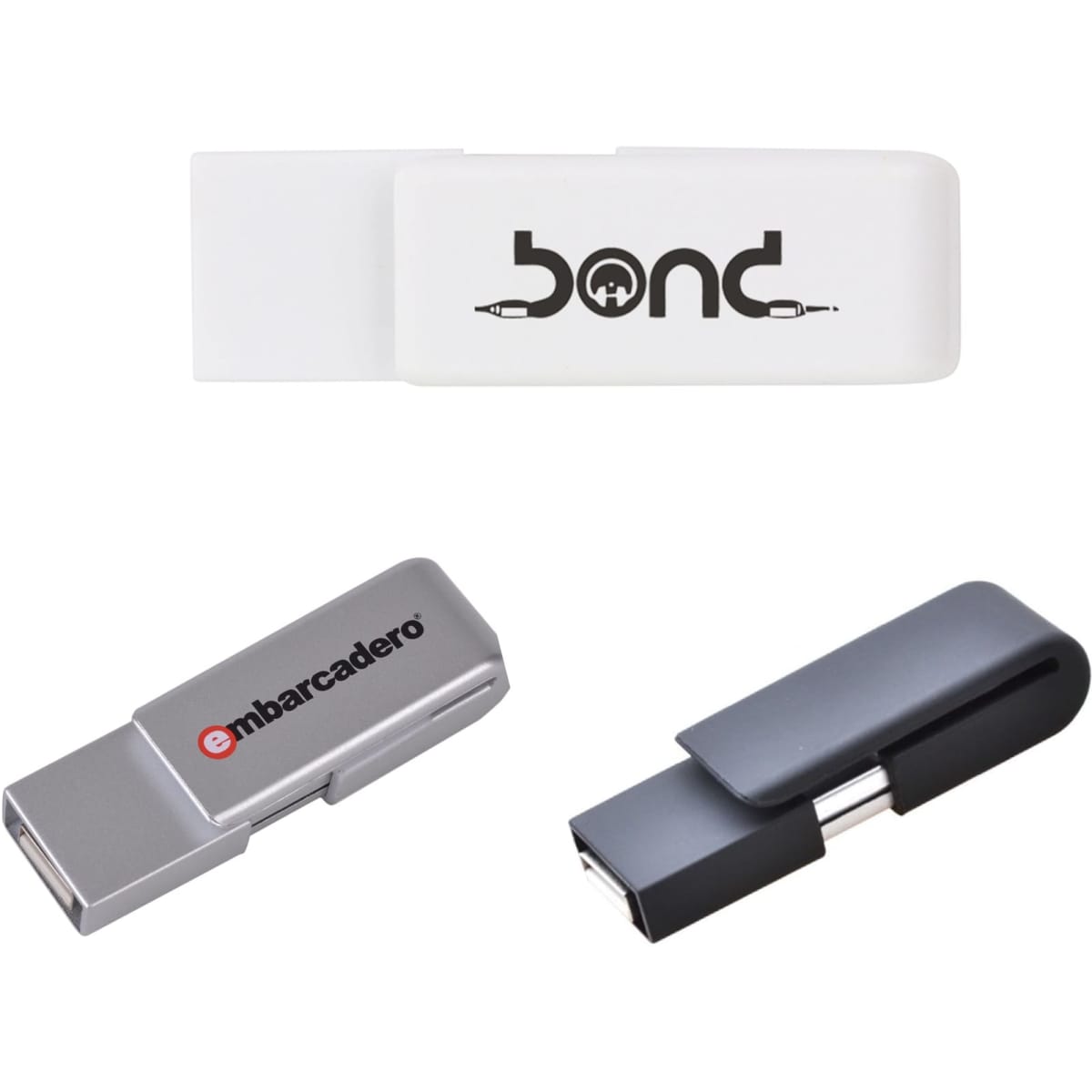 Three flash drives in grey and white, featuring different designs and a logo on one drive.