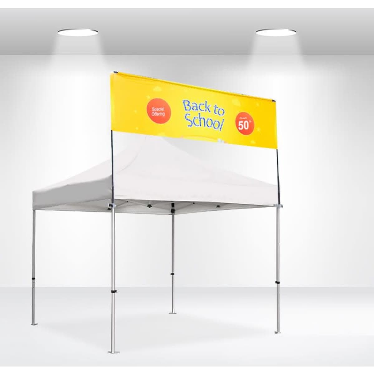 A white square tent with a yellow banner featuring a logo. The tent has a sturdy frame and is set up indoors.