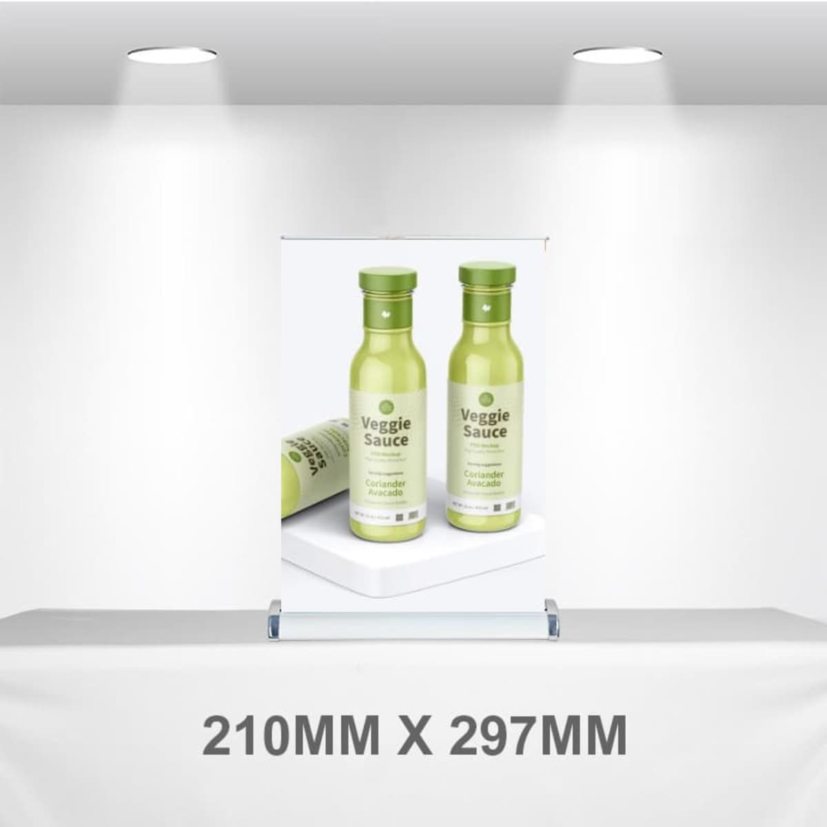 A pull-up banner displaying two green bottles of Veggie Sauce, set against a neutral background.