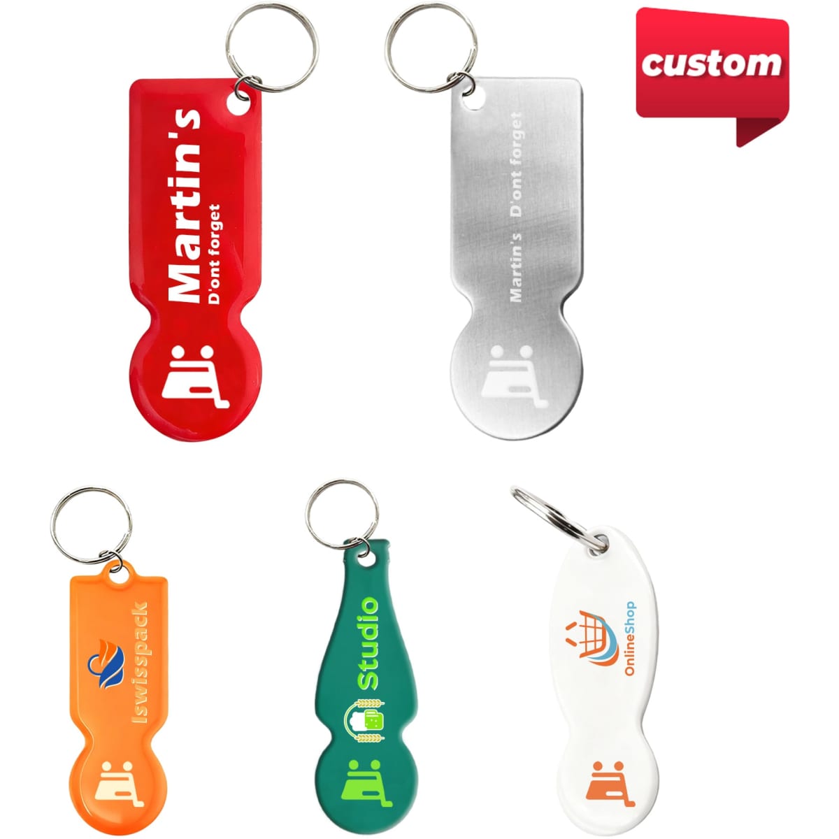 A collection of custom-shaped trolley coin keyrings in red, silver, orange, blue, and green, each featuring a keyring attachment.