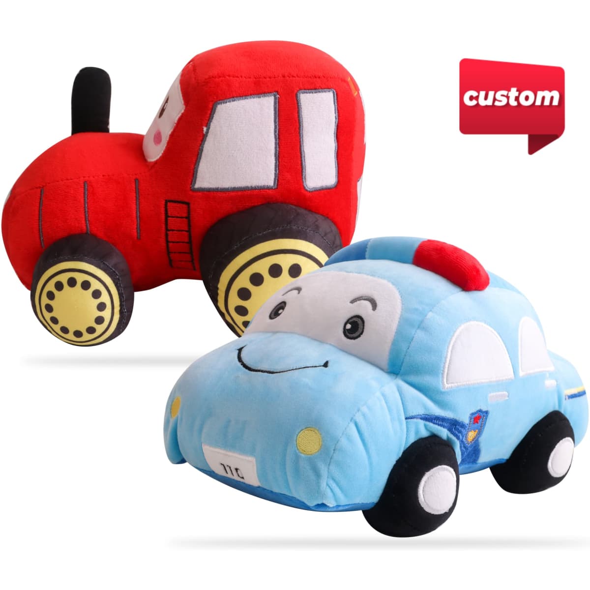 Two plush toys: a red tractor and a blue police car, both with cartoon-like features and soft textures.