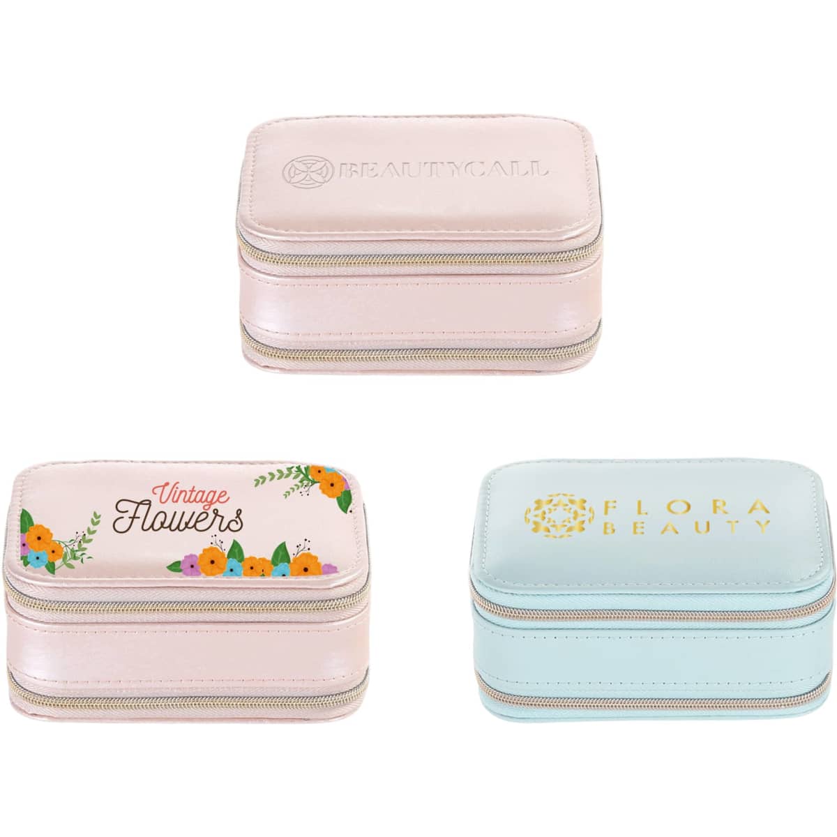 A set of three PU leather jewellery cases in pastel pink and blue, featuring floral designs and zip closures.