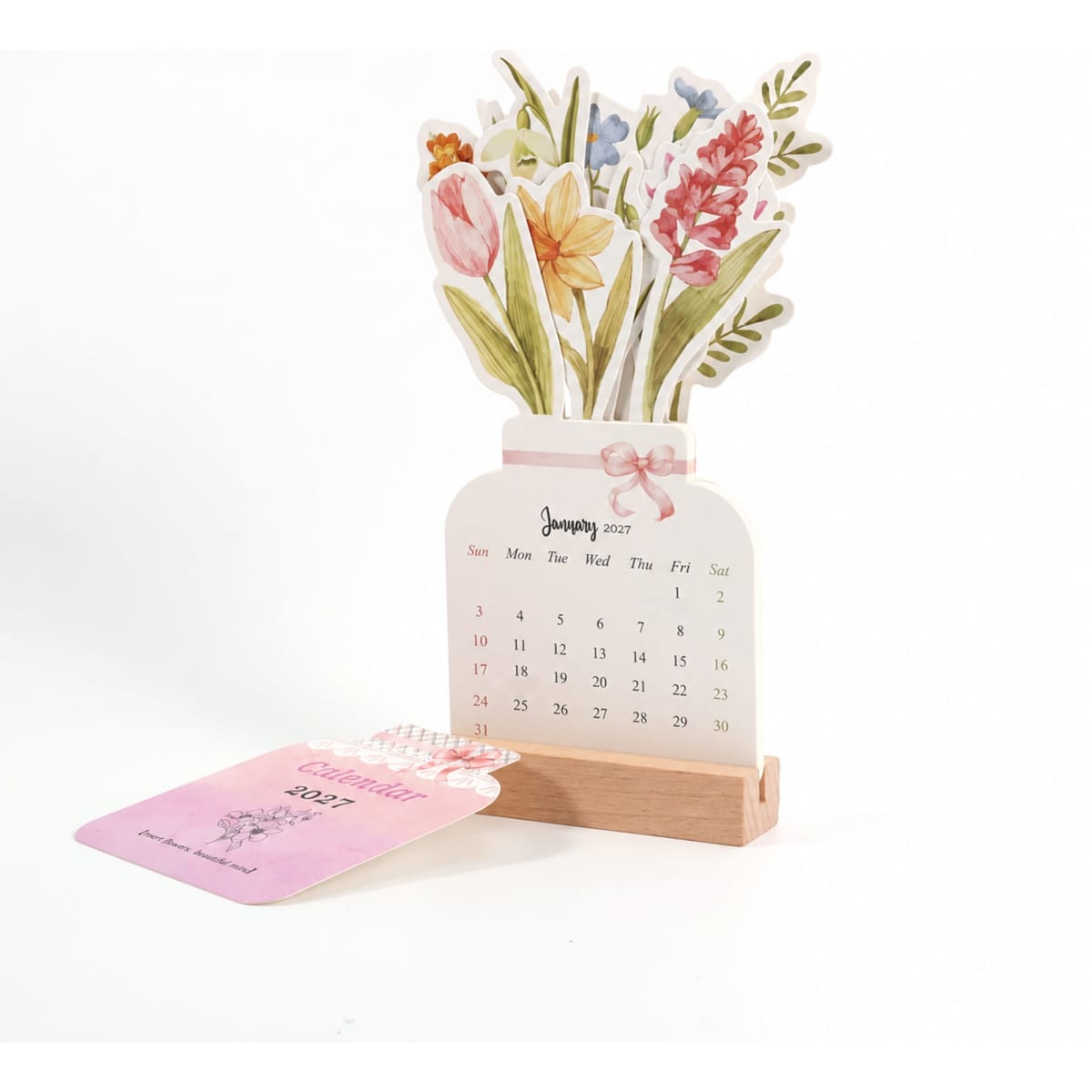 A floral desk calendar with a wooden stand, featuring colourful flowers and a monthly calendar display for January.