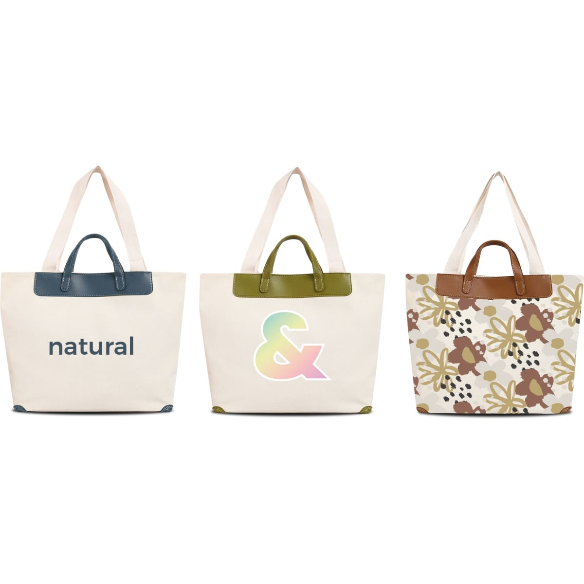 Three canvas bags with leather handles in cream, featuring different designs: text, a colourful symbol, and floral patterns.