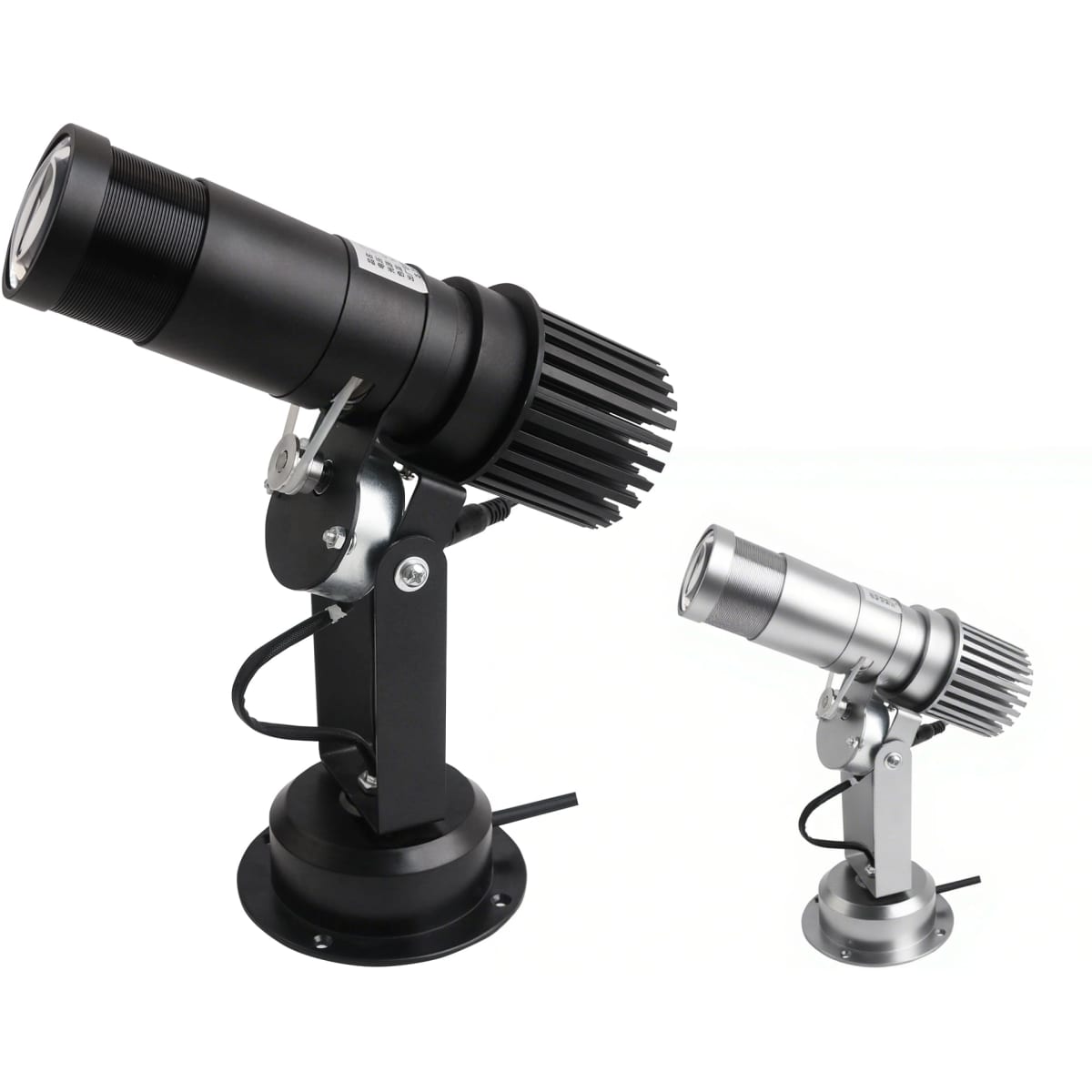 A black and silver LED logo projector light in two sizes, featuring adjustable mounting bases.