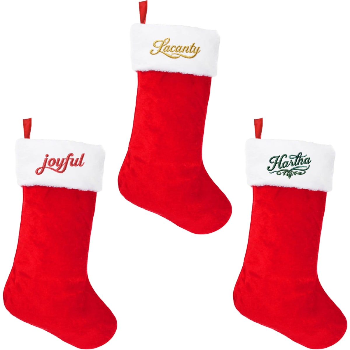 A trio of red and white embroidered Christmas stockings with decorative fur tops and various embellishments.