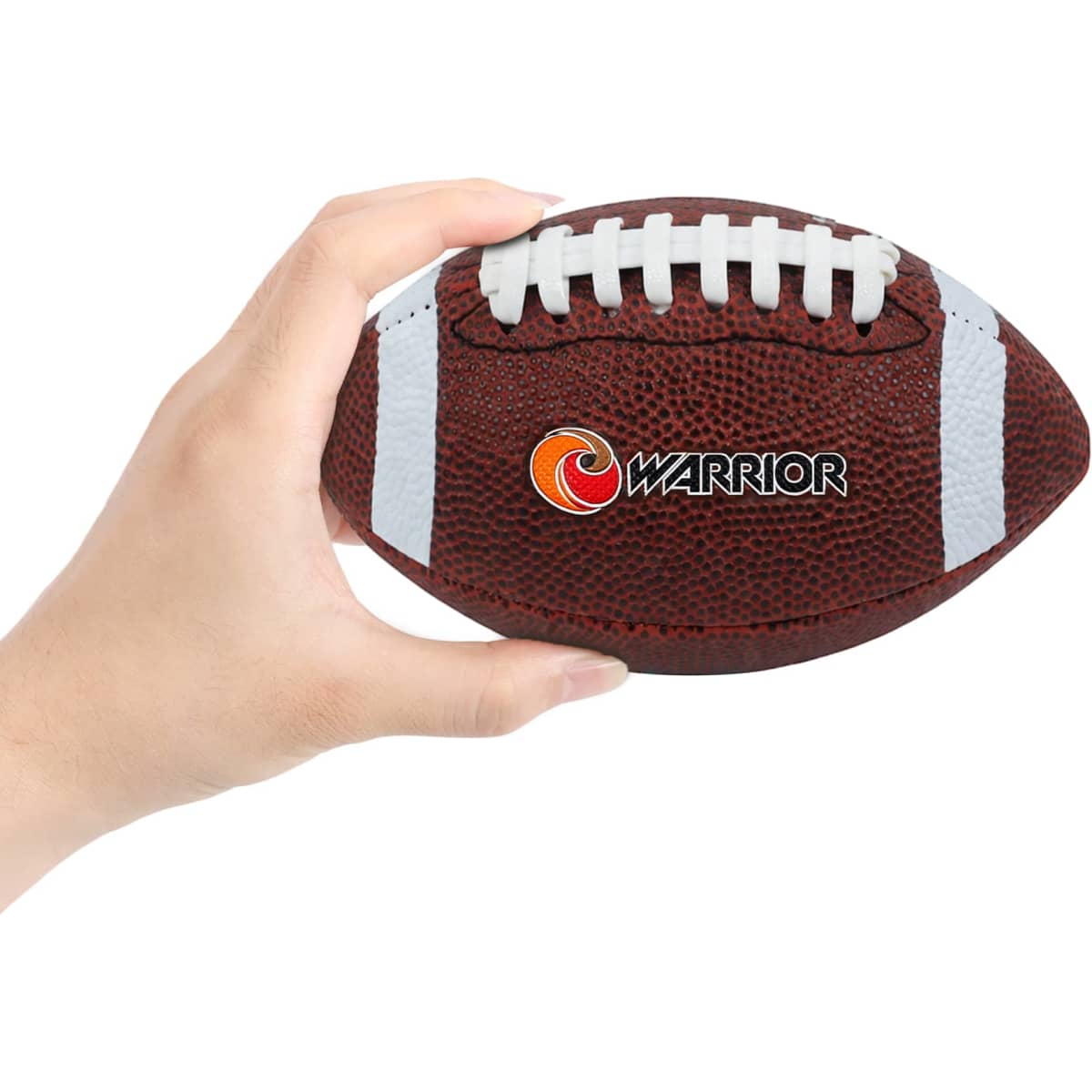 A hand holding a small brown promotional American football with white stripes and a logo.