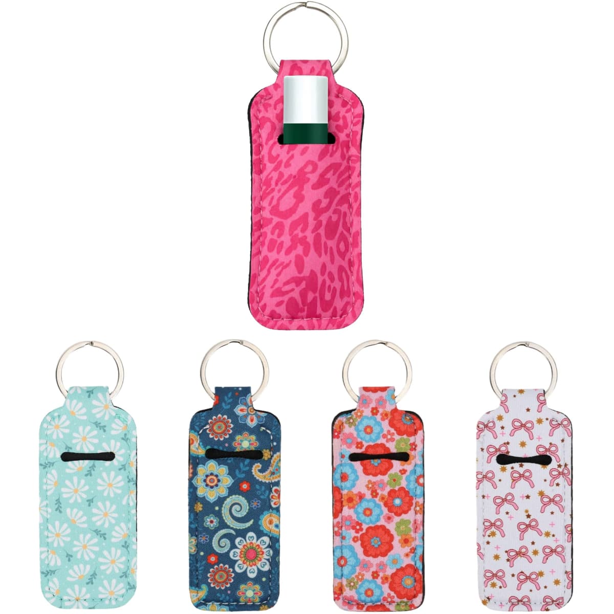 A collection of five Neoprene Lipstick Bags in various colours and floral patterns, with a keyring attachment on each.