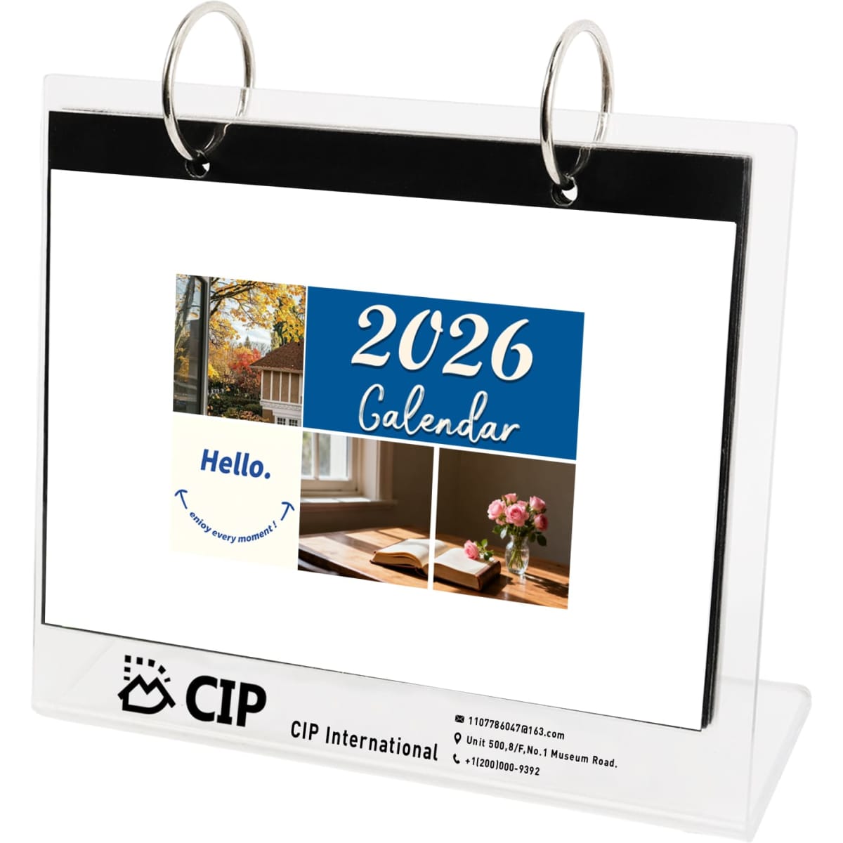 A clear acrylic desk calendar and photo album organiser with a ring binder, displaying a calendar for 2026.