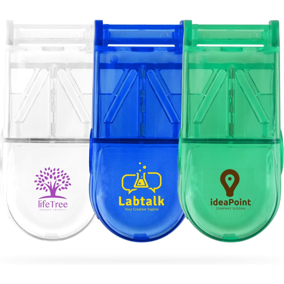 Three pill boxes in clear, blue, and green with a built-in cutter, featuring various logos on each.