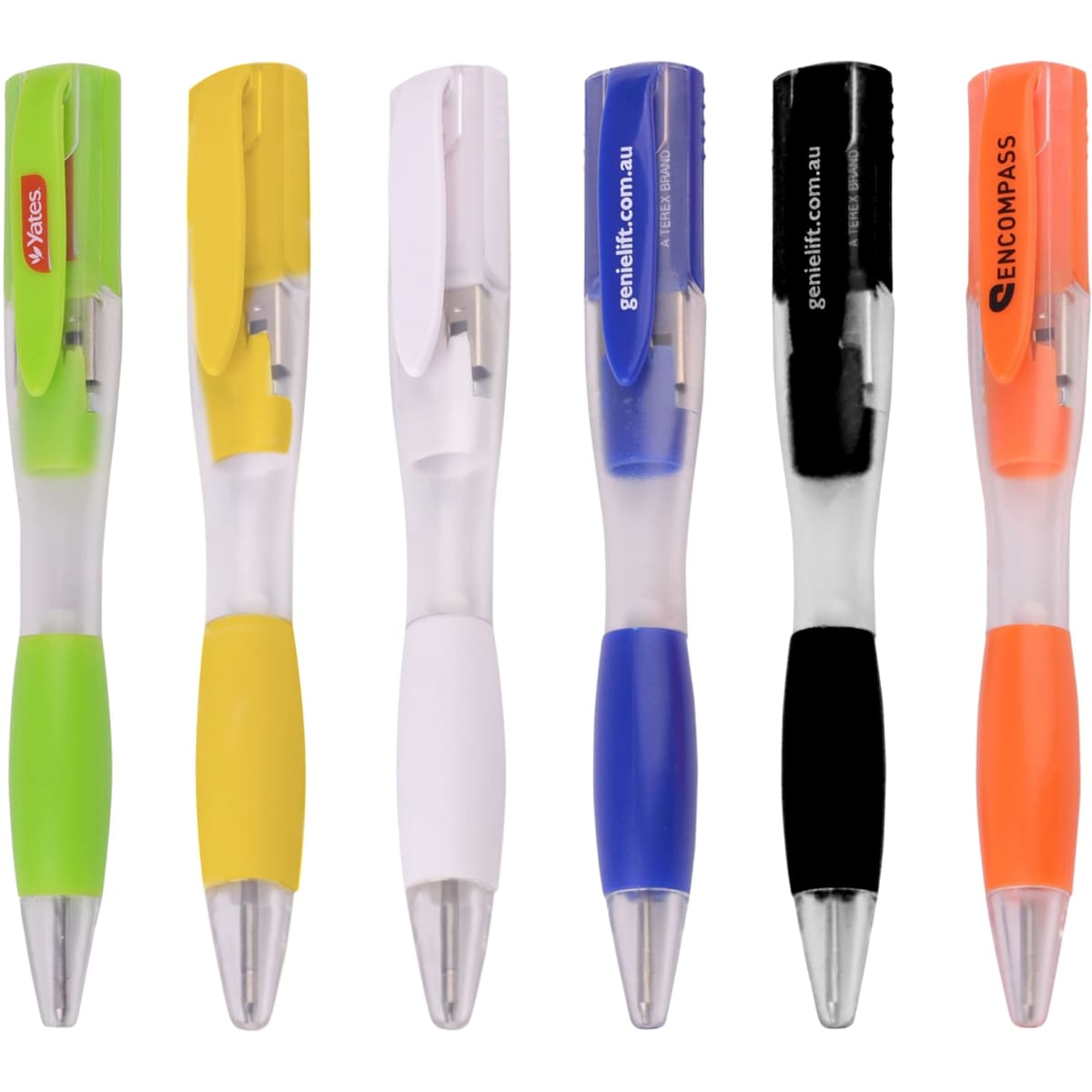 A collection of six ballpoint pens in green, yellow, blue, black, orange, and white with clear barrels and logos.