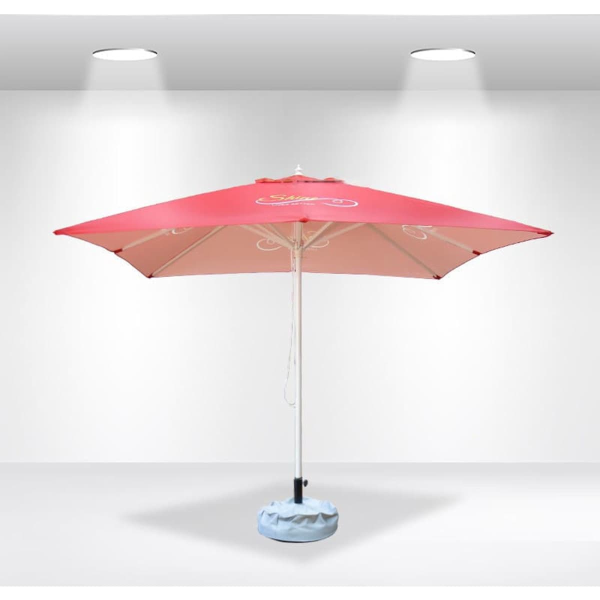 A pink 3x3m square market umbrella with a light blue base and a logo on the canopy.