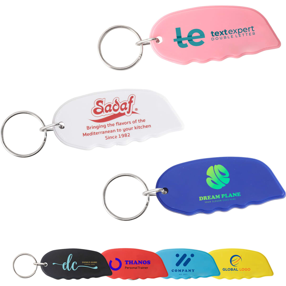 A selection of Mini Cutter Keyrings in pink, white, blue, and black, each with a keyring attachment and a logo.