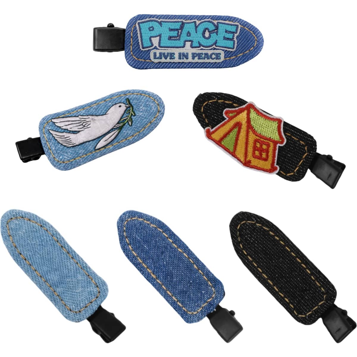 A collection of denim hair clips featuring designs like a dove and a tent, with blue and black denim finishes.