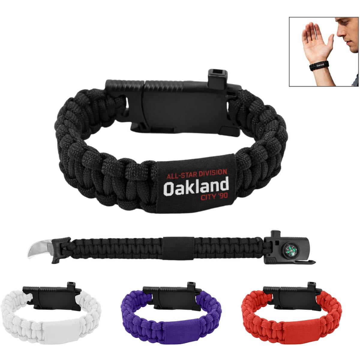 A black paracord survival bracelet with a compass, available in white, purple, red, and additional colours. It features a logo.