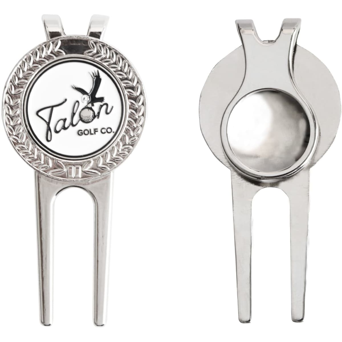 A silver golfers divot tool featuring a round ball marker with a logo. The tool has a pronged design for easy use.